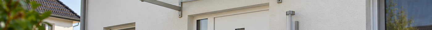 Vordach aus Edelstahl oder Aluminium: Welches Gestell passt zu Ihrer Haustür?